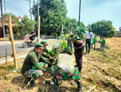 Jaga Kelestarian Alam, Koramil Kutorejo Bareng PT. Arwana Citramulia Tbk Plant V Tanam Pohon Di Desa Kepuhpandak