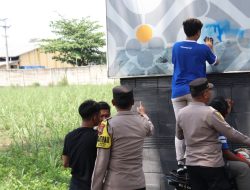 Polres Kudus Bersama Suporter Persiku Kudus Melakukan Aksi Bersih-bersih