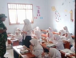 Babinsa Koramil 0815/16 Pacet Dampingi Program Makan Bergizi Gratis Untuk Siswa SMP Amanatul Ummah