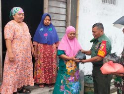 Jelang Idul Fitri, Koramil 0815/06 Kemlagi Bagikan Zakat Fitrah Warga Kurang Mampu